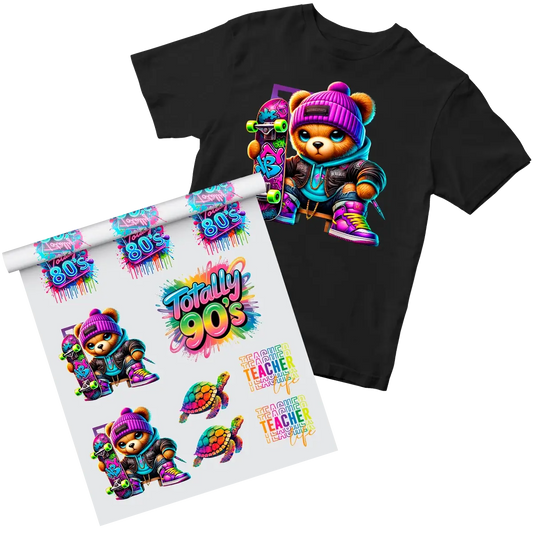 Black t-shirt with a fluorescent DTF print of a cartoon bear on a skateboard, alongside a transfer sheet with the bear design and other bright 80s/90s graphics, highlighting the vibrant fluorescent DTF printing capabilities for custom apparel in Miami.